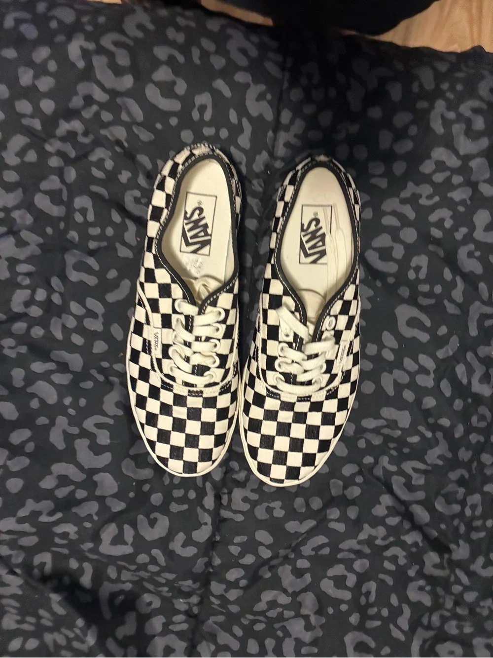 Vans Black and White Checkerboard Slip-On Sneakers
